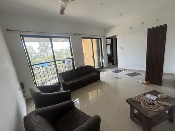 Living Room in 2 BHK Apartment at Shapoorji Pallonji Joyville Hinjewadi, Hinjewadi – for Rent