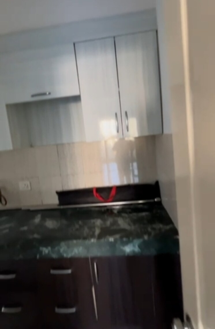 Kitchen, paras-tierea 2 Bedroom 1045 Sq.Ft. Apartment In Sector 137 Noida 8031143