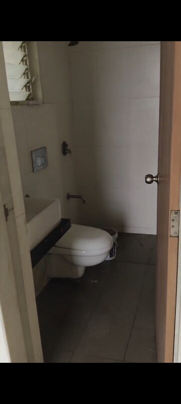 Bathroom in 1.5 BHK Apartment at Godrej Emerald, Ghodbunder Road – for Rent