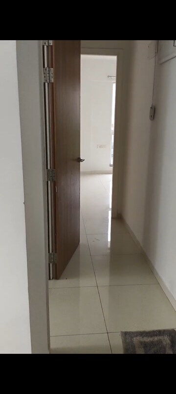 Building Lobby in 1.5 BHK Apartment at Godrej Emerald, Ghodbunder Road – for Rent