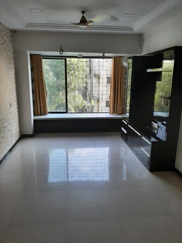 Living Room in 1 BHK Apartment at Satellite Garden, Goregaon East – for Rent