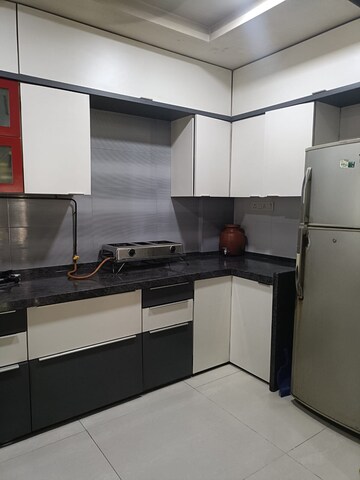 Kitchen in 2 BHK Apartment at Dhaval Sunrise Charkop, Kandivali West – for Rent
