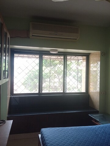 Bedroom in 1 BHK Apartment at Satellite Garden, Goregaon East – for Rent