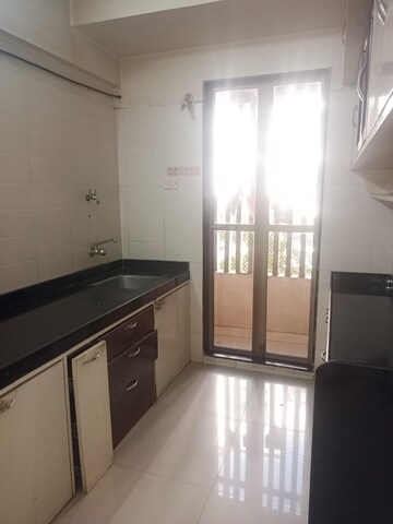 Kitchen in 2 BHK Apartment at Sadguru Complex I, Goregaon East – for Rent
