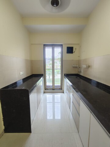 Kitchen in 1.5 BHK Apartment at Siddhi Highland Haven, Balkum Pada – for Sale