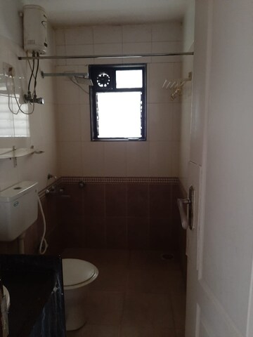 Bathroom in 2 BHK Apartment at Satellite Garden, Goregaon East – for Rent
