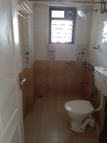Bathroom in 2 BHK Apartment at Satellite Garden, Goregaon East – for Rent