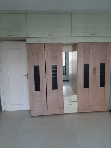 Living Room in 2 BHK Apartment at Satellite Garden, Goregaon East – for Rent