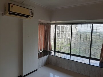 Room in 2 BHK Apartment at Satellite Garden, Goregaon East – for Rent