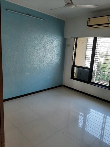 Room in 2 BHK Apartment at Satellite Garden, Goregaon East – for Rent