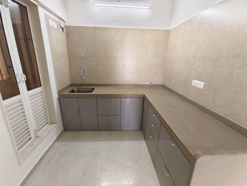 Kitchen in 2 BHK Apartment at Dosti West County, Balkum Pada – for Rent
