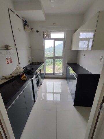 Kitchen in 1.5 BHK Apartment at Godrej Emerald, Ghodbunder Road – for Rent