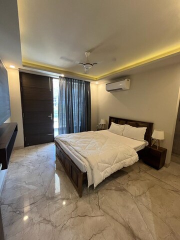Bedroom in 3 BHK Builder Floor at Ansal Sushant Lok I, Sector 43 – for Rent