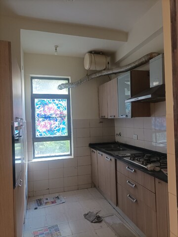 Kitchen in 2 BHK Apartment at Unitech Fresco, Sector 50 – for Rent