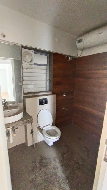 Bathroom in 3 BHK Apartment at Kalpataru Hills Phase II, Manpada – for Rent