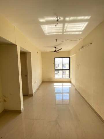 Living Room in 1 BHK Apartment at Lodha Crown Quality Homes Dombivli, Dombivli East – for Rent