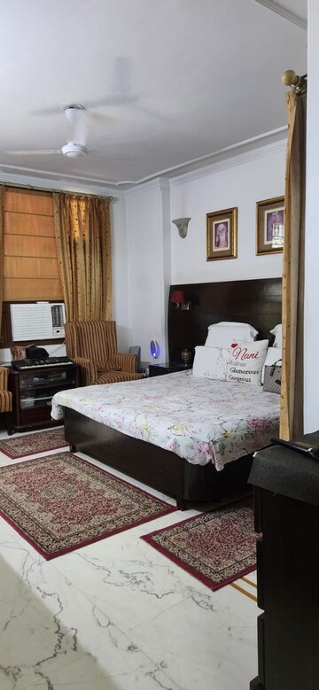 Bedroom in 3 BHK Builder Floor at Ansal Sushant Lok I, Sector 43 – for Rent