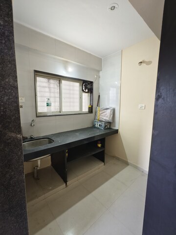 Kitchen in 1 BHK Apartment at Espree Eminence, Wadgaon Sheri – for Rent