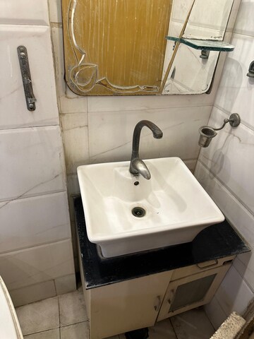 Bathroom in 2 BHK Apartment at Panchsheel Park – for Rent