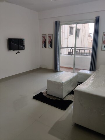Living Room in 1 BHK Apartment at Wadgaon Sheri – for Rent