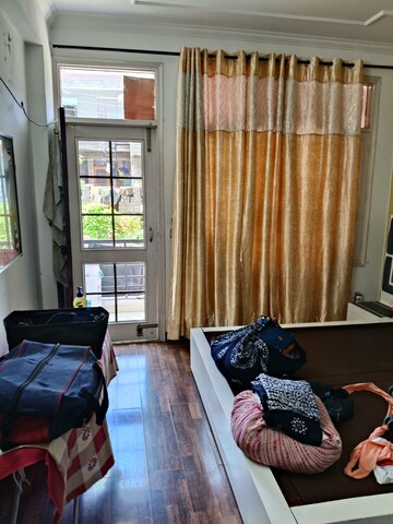 Bedroom in 3 BHK Apartment at Dhakoli Village – for Sale