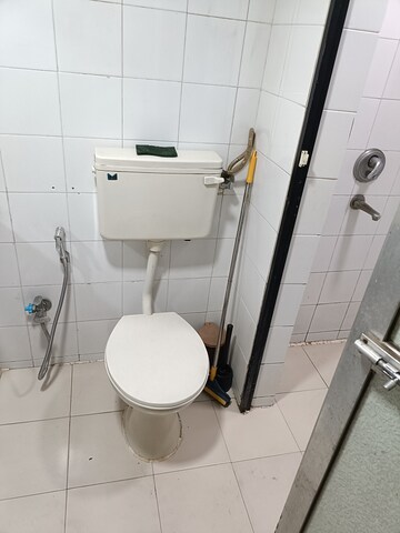 Bathroom in 1 BHK Apartment at Royal Palms, Goregaon East – for Rent
