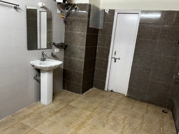 Bathroom in 4 BHK Apartment at Rohtas Presidential Tower, Vibhuti Khand – for Rent