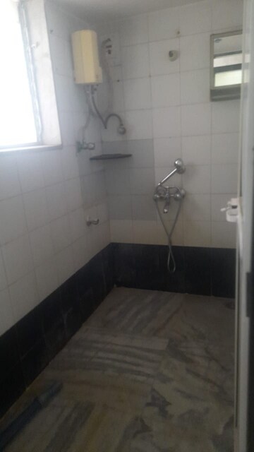 Bathroom in 1 BHK Apartment at Vasant Valley Complex, Malad East – for Rent