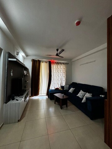 Living Room in 3 BHK Apartment at Bhartiya Nikoo Homes Phase 2, Thanisandra Main Road – for Rent