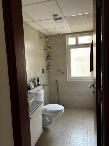 Bathroom in 3 BHK Apartment at Bhartiya Nikoo Homes Phase 2, Thanisandra Main Road – for Rent
