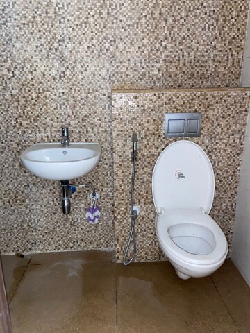 Bathroom in 1.5 BHK Apartment at Lodha Palava City, Dombivli East – for Rent