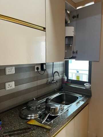 Kitchen in 3 BHK Apartment at Paras Dews, Sector 106 – for Sale