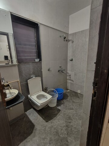 Bathroom in 2 BHK Apartment at Sudarshan Sky Garden, Ghodbunder Road – for Rent