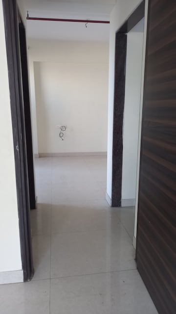 Room in 1 BHK Apartment at Ajmera New Era, Kalyan West – for Rent