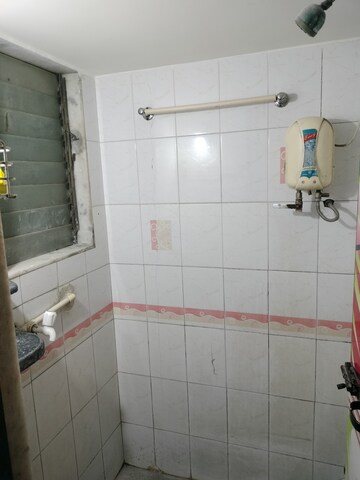 Bathroom in 1 RK Apartment at Deepankar CGHS, Dadar West – for Rent