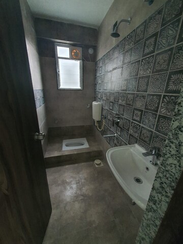 Bathroom in 2 BHK Apartment at Unique group Zest County, Pune Airport – for Sale