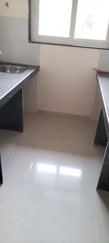Kitchen in 2 BHK Apartment at Ashar Axis, Majiwada – for Rent