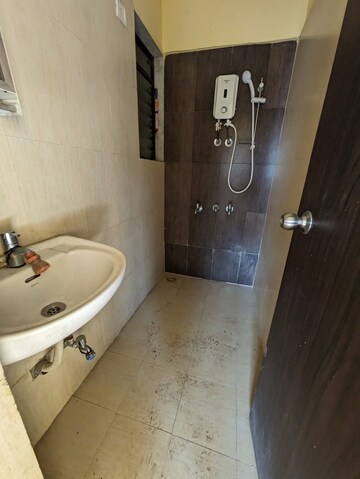Bathroom in 1 BHK Apartment at Raunak City Phase 2, Kalyan West – for Rent