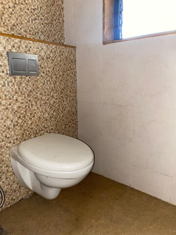 Bathroom in 1 BHK Apartment at Lodha Palava City, Dombivli East – for Rent