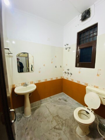 Bathroom in 2 BHK Apartment at Sunny Enclave – for Rent