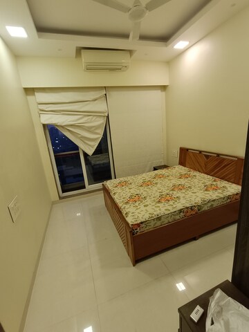 Bedroom in 2 BHK Apartment at The Wadhwa Palm Beach Residency, Nerul – for Rent