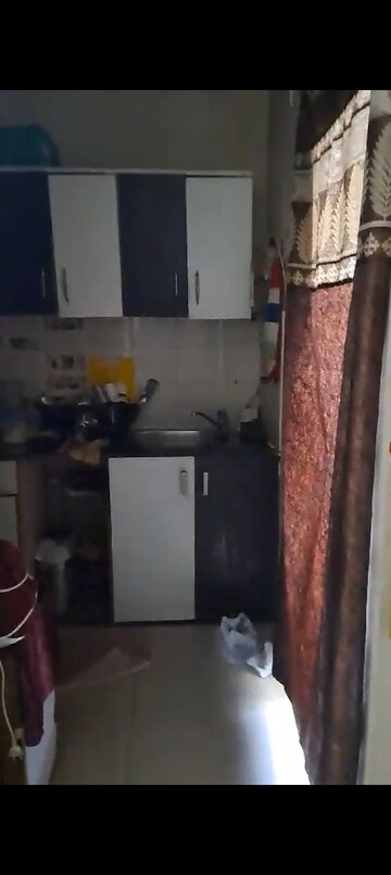 Kitchen in 2 BHK Apartment at Charms Castle, Raj Nagar Extension – for Sale