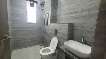 Bathroom in 2 BHK Apartment at Rishabraj Blue Lotus, Khar West – for Sale