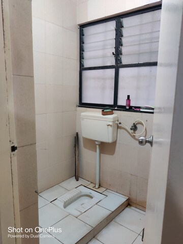 Bathroom in 2 BHK Apartment at Vishal Srushti Residency, Wadgaon Sheri – for Rent