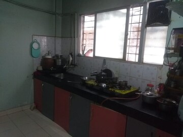 Kitchen in 1 BHK Apartment at Tanay Punyanagari, Wadgaon Sheri – for Sale