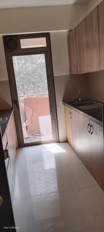 Kitchen in 2.5 BHK Apartment at Lodha Splendora, Ghodbunder Road – for Rent