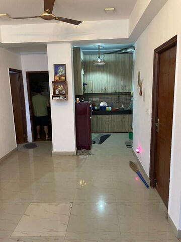 Kitchen in 2.5 BHK Apartment at Nimbus The Golden Palm, Sector 168 – for Rent