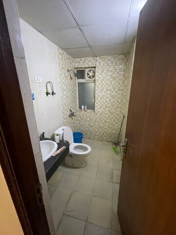 Bathroom in 2.5 BHK Apartment at Nimbus The Golden Palm, Sector 168 – for Rent