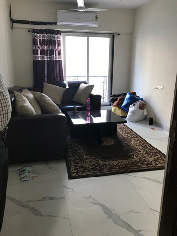 Living Room in 1 BHK Apartment at JK Iris, Mira Road – for Rent
