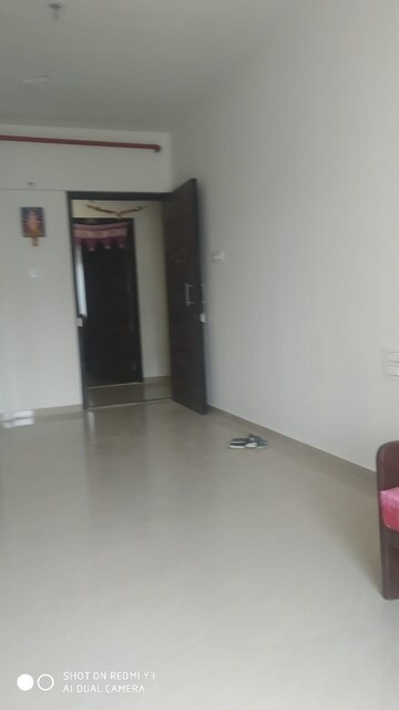 Living Room in 1 BHK Apartment at JP North Elara, Mira Road – for Rent